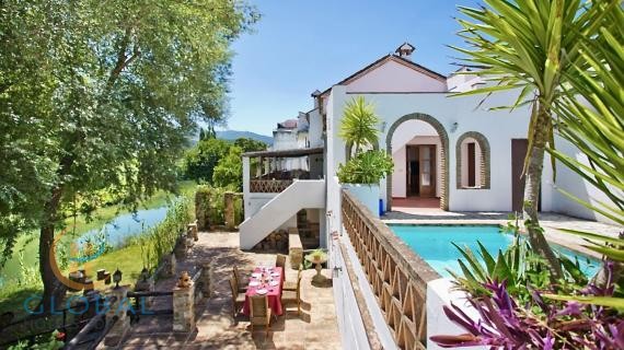 A very charming riverside boutique BB or rental business around Ronda