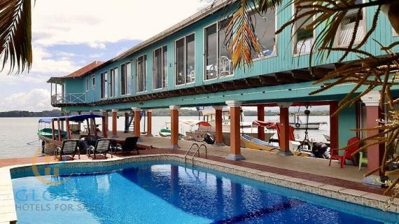 Rare Oceanfront boutique hotel with 22 rooms and private marina 